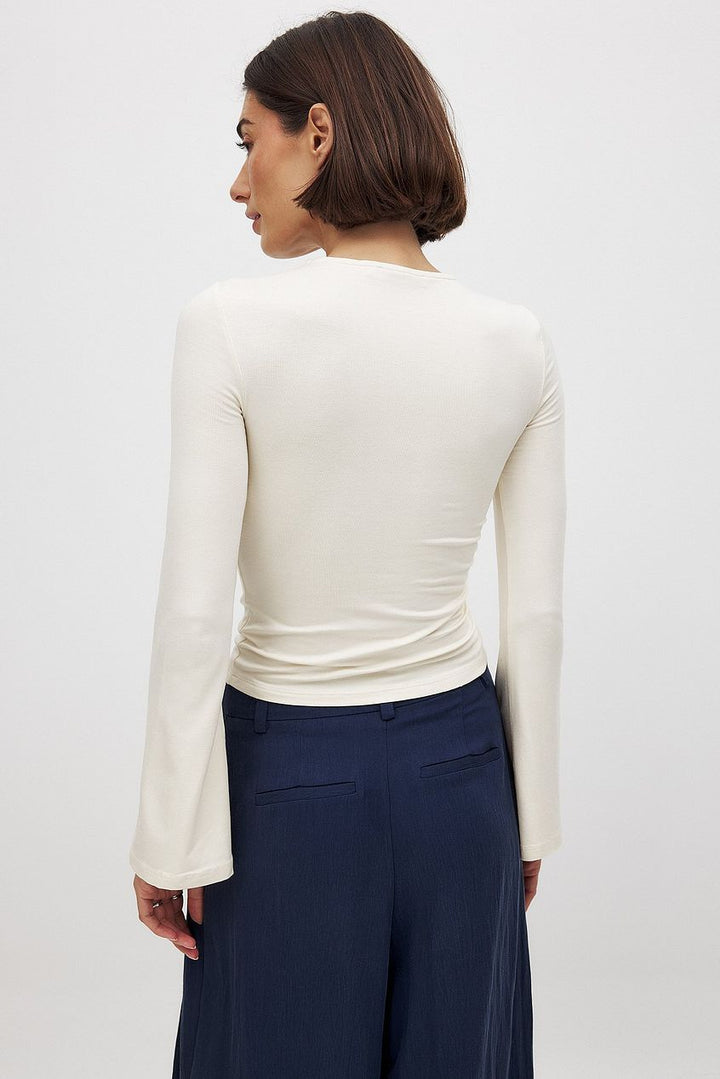 EMERY – Long Sleeve Crop Top with Twist Front